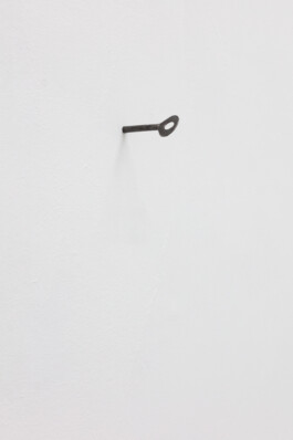  Key hammered into wall, 2023. Security key, wall, 3 x 2 x 7.5 cm